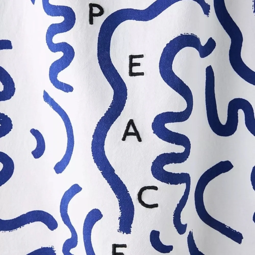 Anthropologie-Maristella Gonzalez Peace Dish Towel